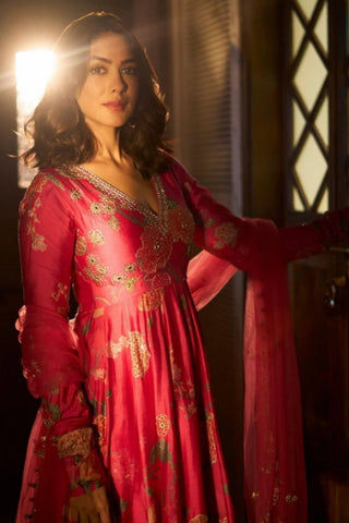 Elegant pink floral V-neck Anarkali with heavy hand embroidery in sequins, cutdana, mirrors, and resham, styled with a net dupatta, ideal for engagement or reception wear