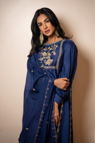 Modern electric blue silk kurta set with gold anar motif embroidery and detailed pants — blending traditional artistry with contemporary elegance