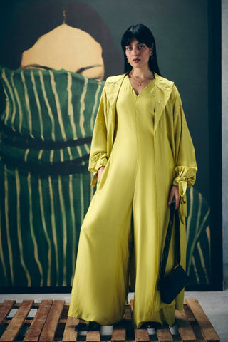 Elegant yellow Kira jumpsuit set styled as a chic statement outfit for women, perfect for cocktail parties, wedding celebrations, festive gatherings, luxury dinners and sophisticated evening occasions.