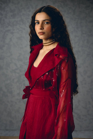 Nami burgundy co-ord styled with a modal silk bustier and fitted pants, offering a polished three-piece silhouette for cocktail parties, dinners and celebrations.

