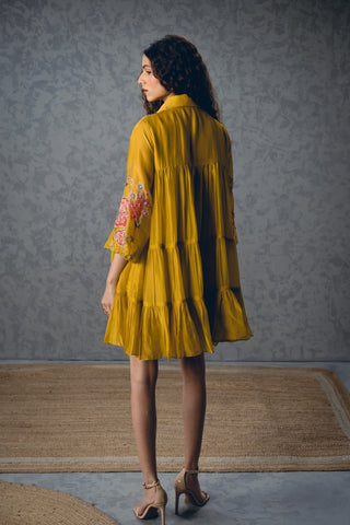 Back look of Yellow Lana short dress crafted in luxurious silk organza, featuring a relaxed loose-fit silhouette with printed sleeves and delicate embroidered collar and yoke, perfect for elegant parties and festive occasions.