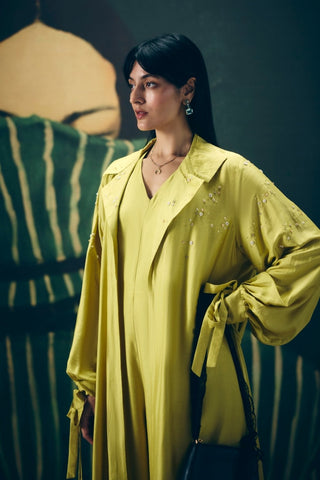 Statement yellow Kira jumpsuit set for women creating an effortlessly elegant party look, suitable for cocktail evenings, luxury dinners, festive celebrations, special events and glamorous social occasions.