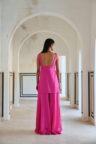 Back look of pink floral embroidered short kurta with palazzo and dupatta. Elegant kurta for women's wear.