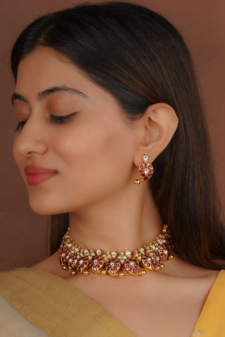Traditional Indian stone studded designer Jadau necklace set for women with matching push-back earrings.