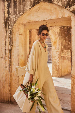 A linen jumpsuit with silk Jacket is absolutely versatile garments that can be styled for a wide range of occasions.
