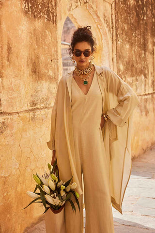 V neck linen jumpsuit in ivory for a relaxed day out on a date or a perfect outfit for any occasion.