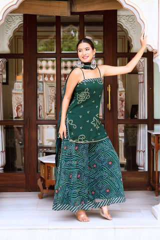 Designer green bandhani kurta set with georgette fabric, paired with palazzo and dupatta, offering comfort and style for everyday and festive wear.