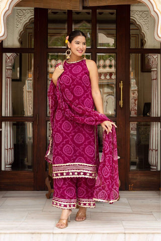 Pomcha Jaipur Bandhej georgette suit set in cranberry shade with dupatta, fully stitched women’s ethnic attire showcasing traditional tie dye pattern and comfortable festive wear styling.