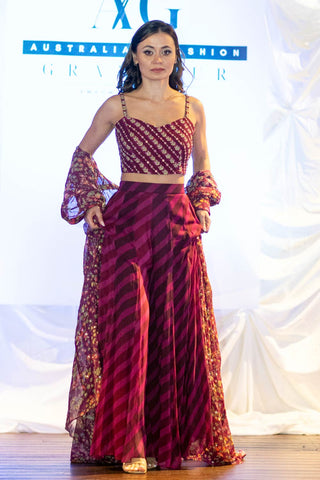 Elegant purple jacket set with floral embroidery on the blouse and jacket – perfect for festive and formal occasions. Designed by Paulmi and Harsh.