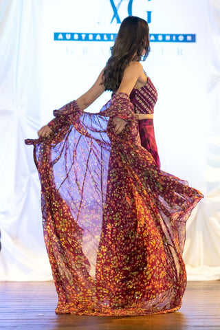 Stylish purple jacket set featuring handcrafted floral embroidery and refined details.