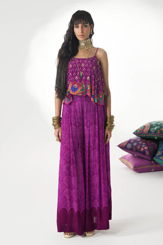 Purple Martini Heavy Embroidery Border Top, Paired With Purple Self Print Pleated Palazzo. A perfect attire for classy parties, boho style soirees, pub gatherings etc. Designed by Siddtharth Bansal.