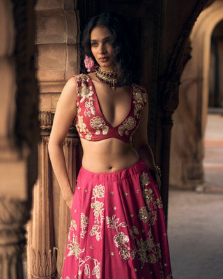 Close up look of the deep V neck blouse with zardozi, aari and sequins work.