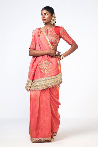 Elegant Rishi and Vibhuti Coral Tales Saree designed in soft pink organza and tissue with embroidered floral motifs, statement zari border and a matching blouse, offering timeless luxury for weddings, festive occasions, and special events.