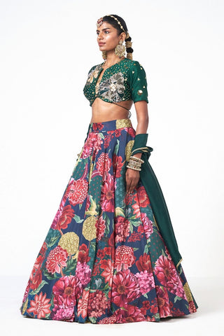 Elegant three-piece lehenga set crafted with crepe, dupion, and organza fabric for statement occasion wear.