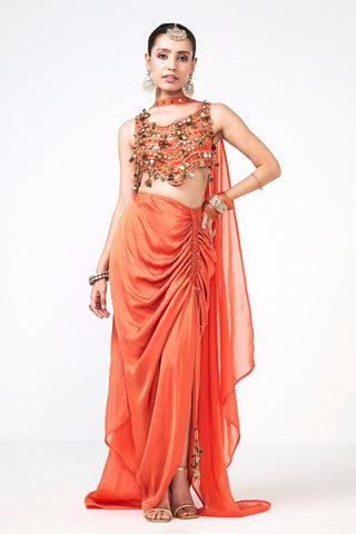 Vibrant orange, crafted in crepe, finished with hand-appliquéd patchwork detailing. A three-piece drape set built for sangeet nights, mehendi mornings, and every festive function in between.