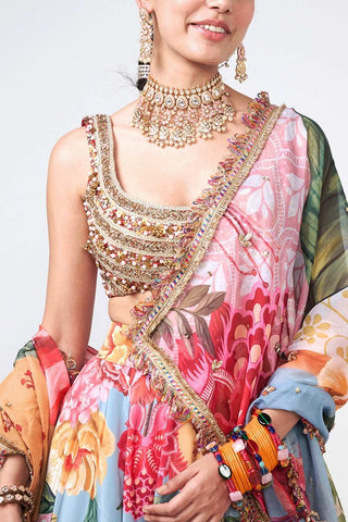 Designer Gul Bagh lehenga by Rishi and Vibhuti with handcrafted floral embroidered motifs, refined artisanal detailing, matching blouse, and dupatta, designed for women's luxury ethnic wear, wedding functions, receptions, and festive celebrations.