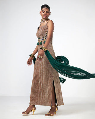 Side profile capturing the graceful cape draping over the shoulders of the Sand Dunes Dress.