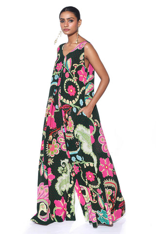 Model wearing Emerald Accent Royal Paisley Inverted Box Pleat, Wide Leg Jumpsuit. Perfect for cocktail parties, dinner date or bohemian theme parties or for sundown soirees.