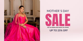 Woman in a pink dress with Mother's Day sale offer on selected dresses upto 25% off