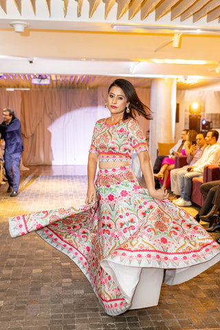Model flaunting a bold paisley printed co-ord set with crop top and flared skirt on the Sydney runway. A prefect dress for parties, events or wedding ceremonies.