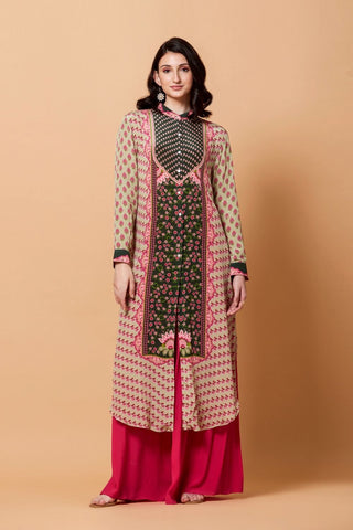 A cream shirt dress featuring a running boota print with a contrasting green centre panel adorned with floral motifs, designed with an SB signature style and a structured mandarin collar for an elegant Indo-western look. Designed by Siddhartha Bansal.