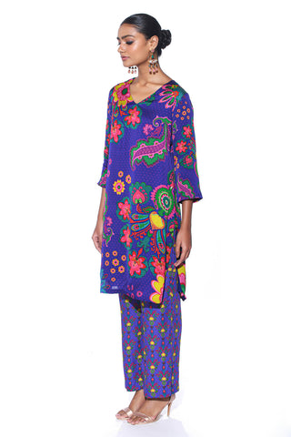 Side look of twilight blue kurta set for a chic and effortless look. Bohemian dress for Cocktail parties, Resort, Lounge wear casual elegance, and modern ethnic styling.